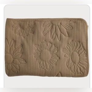 Kate Quinn Embroidered sunflower quilt